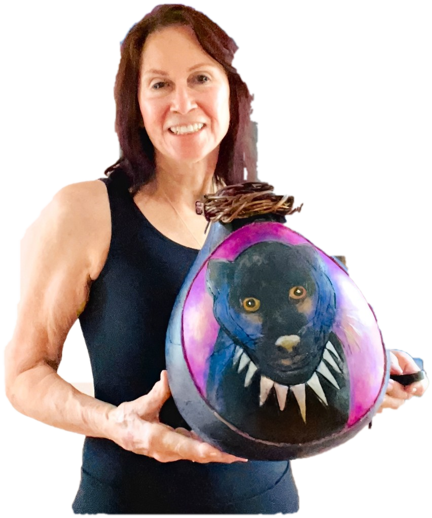 JWolfe holding one of her painted gourds